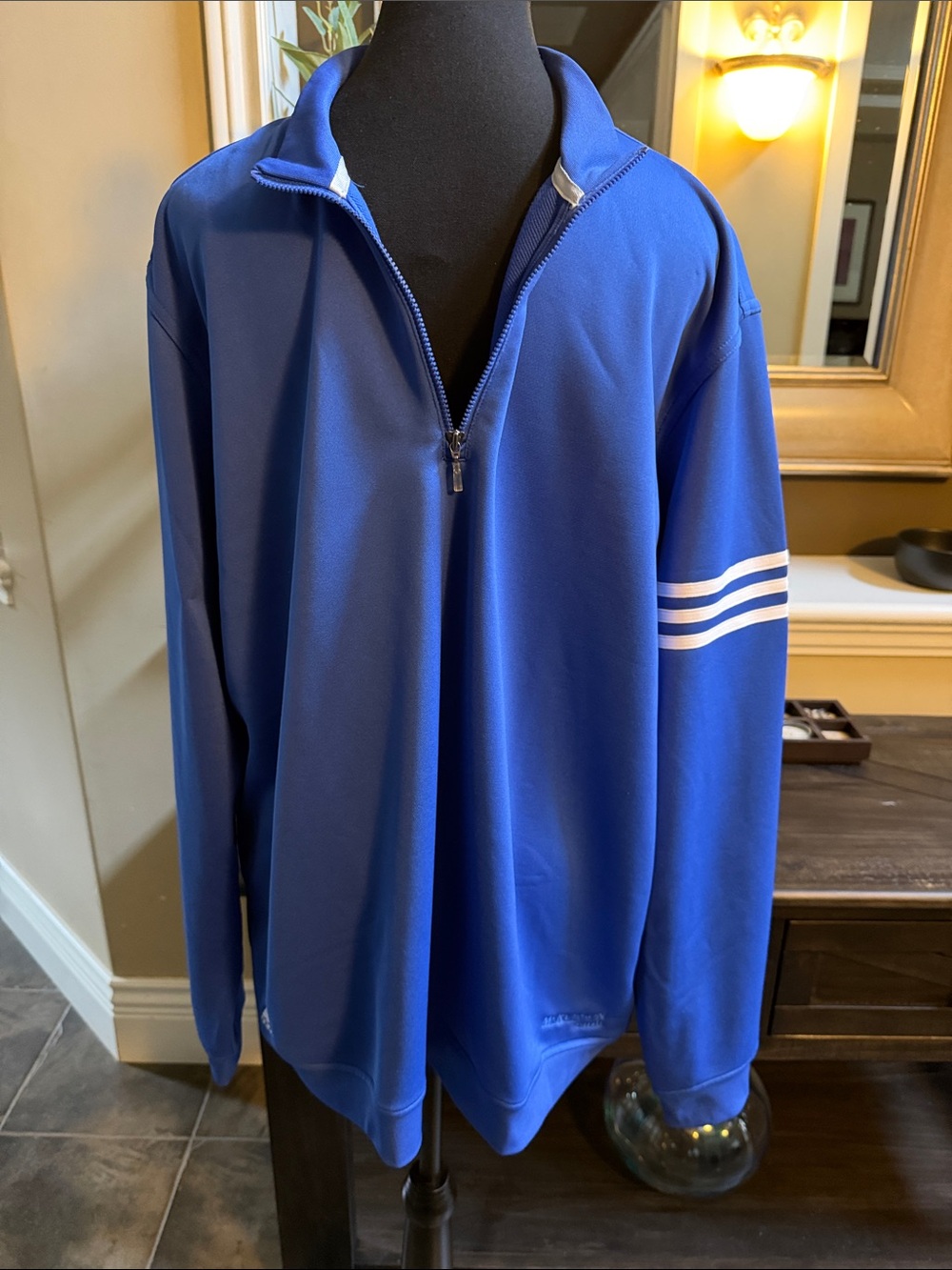 NWT. Mens Adidas 1/4 zip pullover in royal blue. Climalite